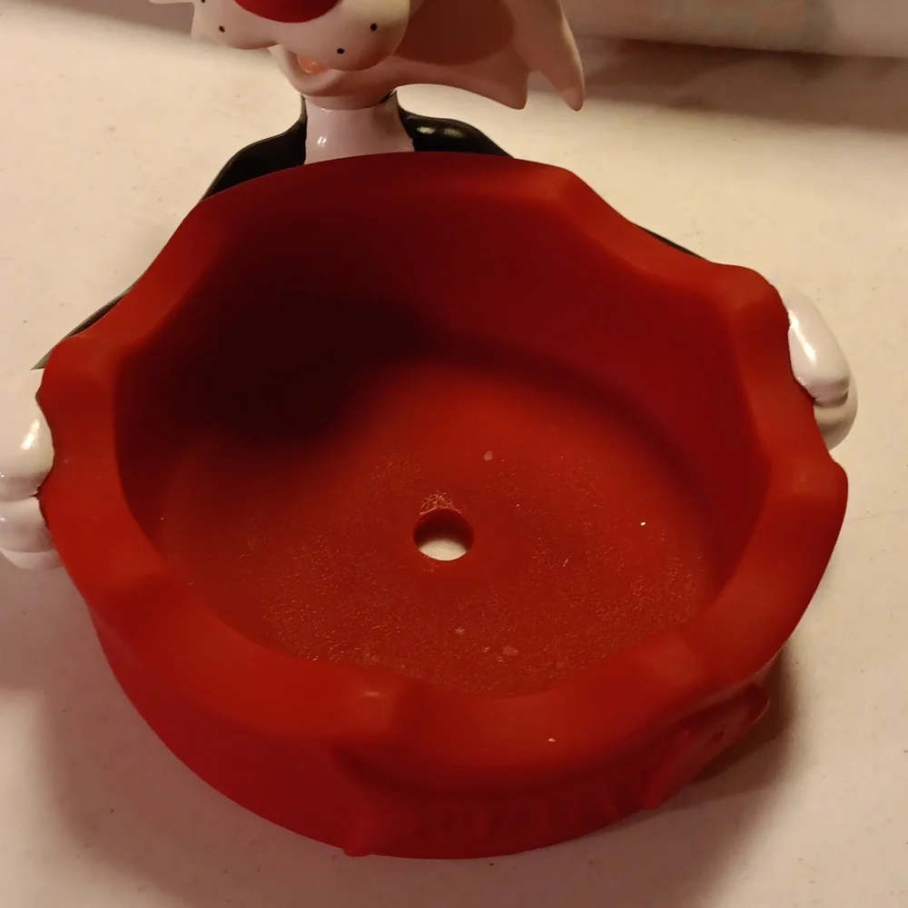 Looney Tunes Sylvester cat bowl holder.